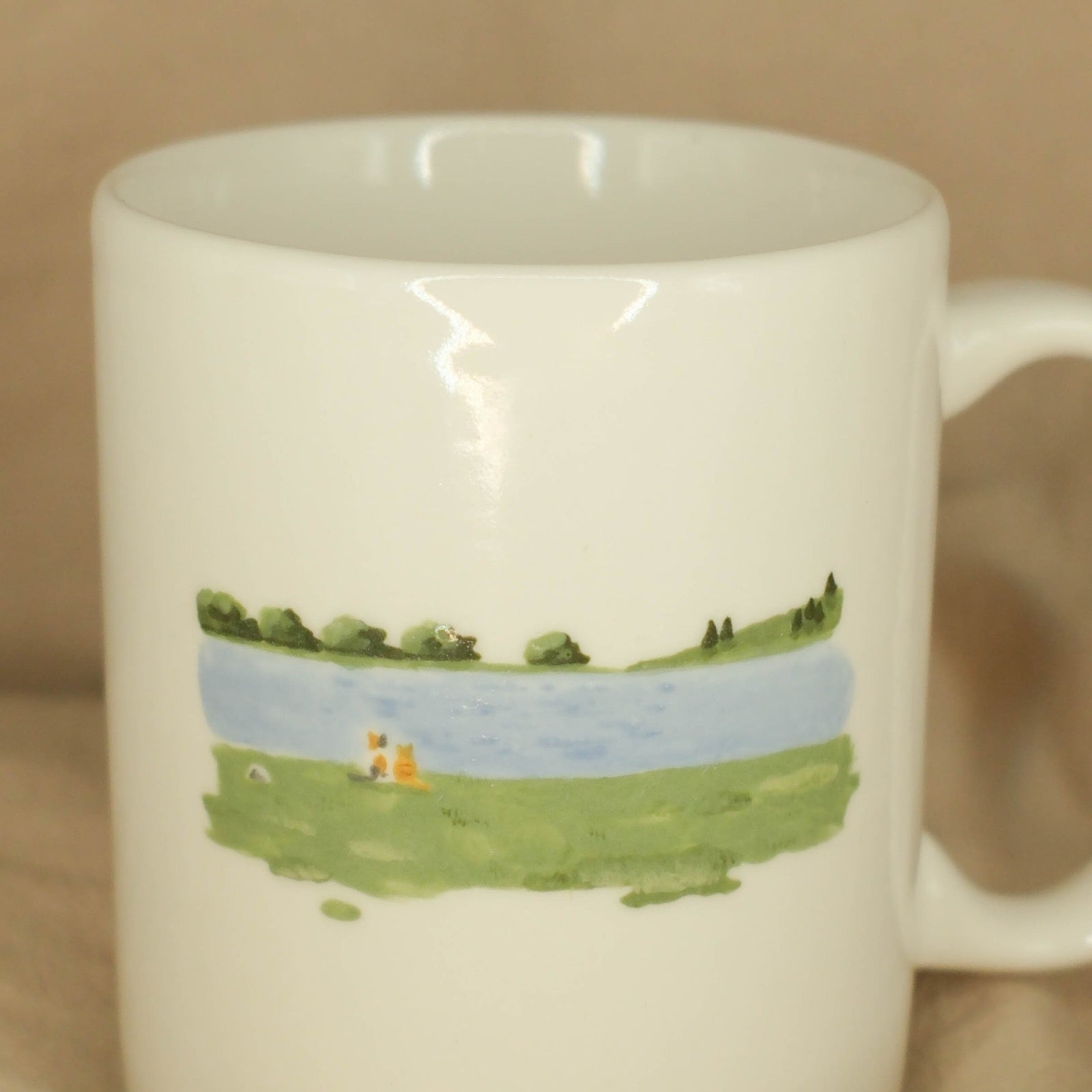 Two Cats, Two Sizes, One Quiet View