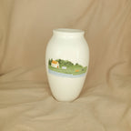 A Home, a Blanket, and Two Dogs Mid-Chase